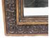 Picture of Nice mirror with carved wood frame. 32" x 20"