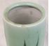 Picture of Chinese celadon vase / hat stand with applied design