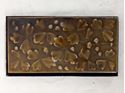Picture of 1880's J & J.C. Low tile in metal frame